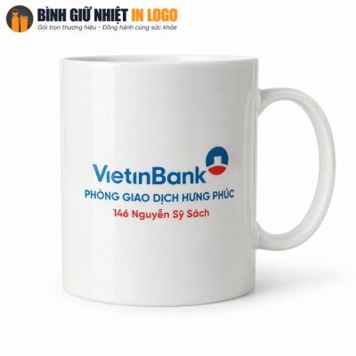 Cận cảnh cốc sứ trắng quai C in logo VietinBank Phòng giao dịch Hưng Phúc